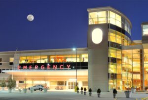 Exterior of a hospital emergency room at night